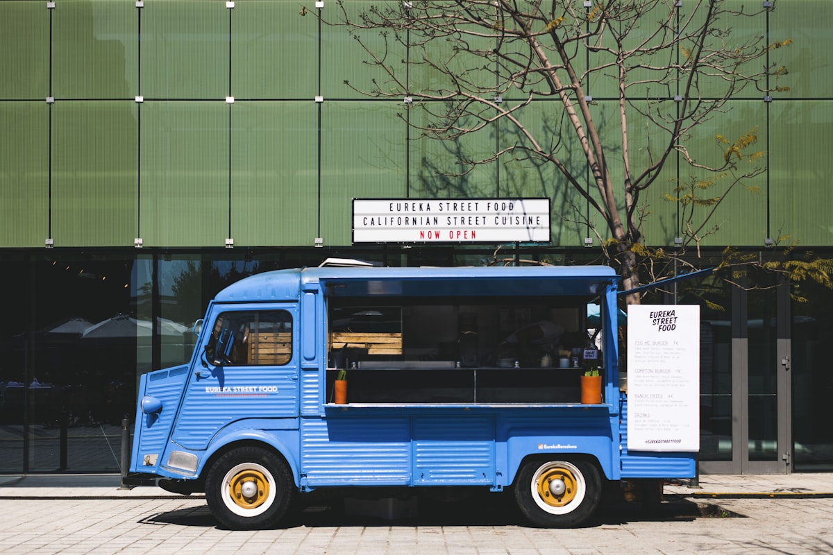 Food truck serving customers at a busy urban location